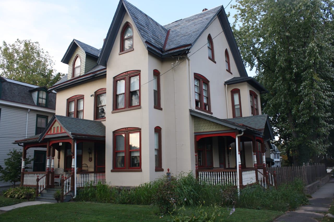 A Victorian house with a steep slate roof and deep porches in the Ivyland Historic District, inside the Warminster ZIP in Bucks County, Pennsylvania.