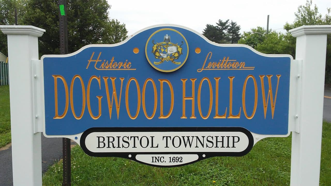 The Historic Levittown entrance sign for the Dogwood Hollow section, carrying the Bristol Township seal.