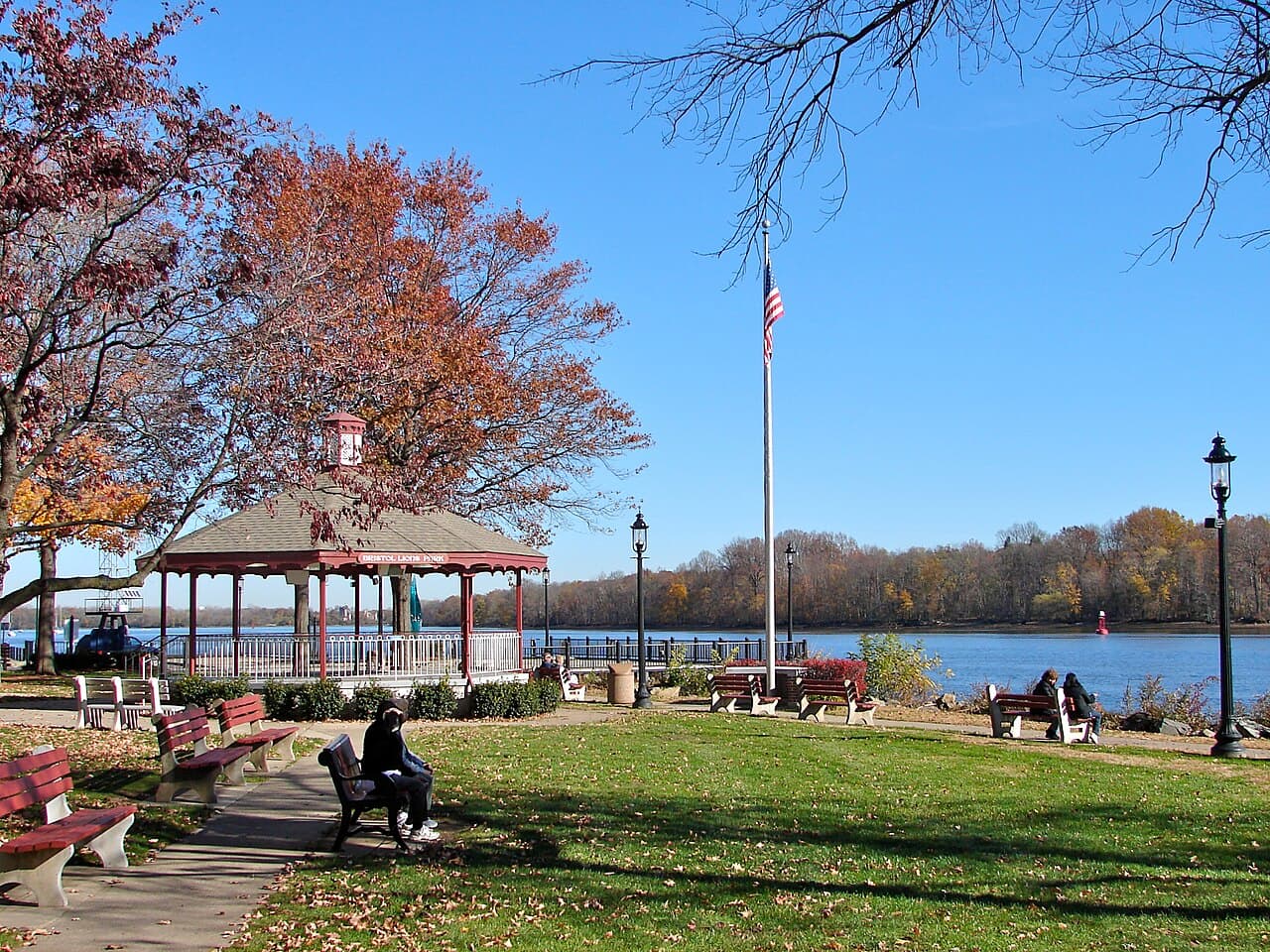 The bandstand at Lions Park on the Bristol, Pennsylvania riverfront in autumn, at the foot of Mill Street where it meets the Delaware River.