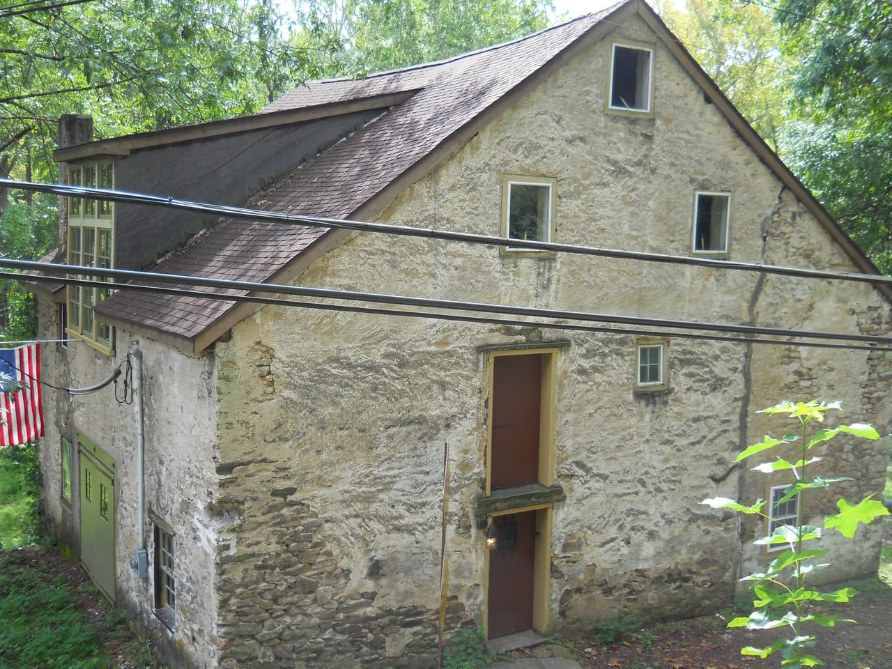 A stone mill building at Fetter’s Mill Village in Bryn Athyn, in the Huntingdon Valley ZIP, Montgomery County, Pennsylvania.